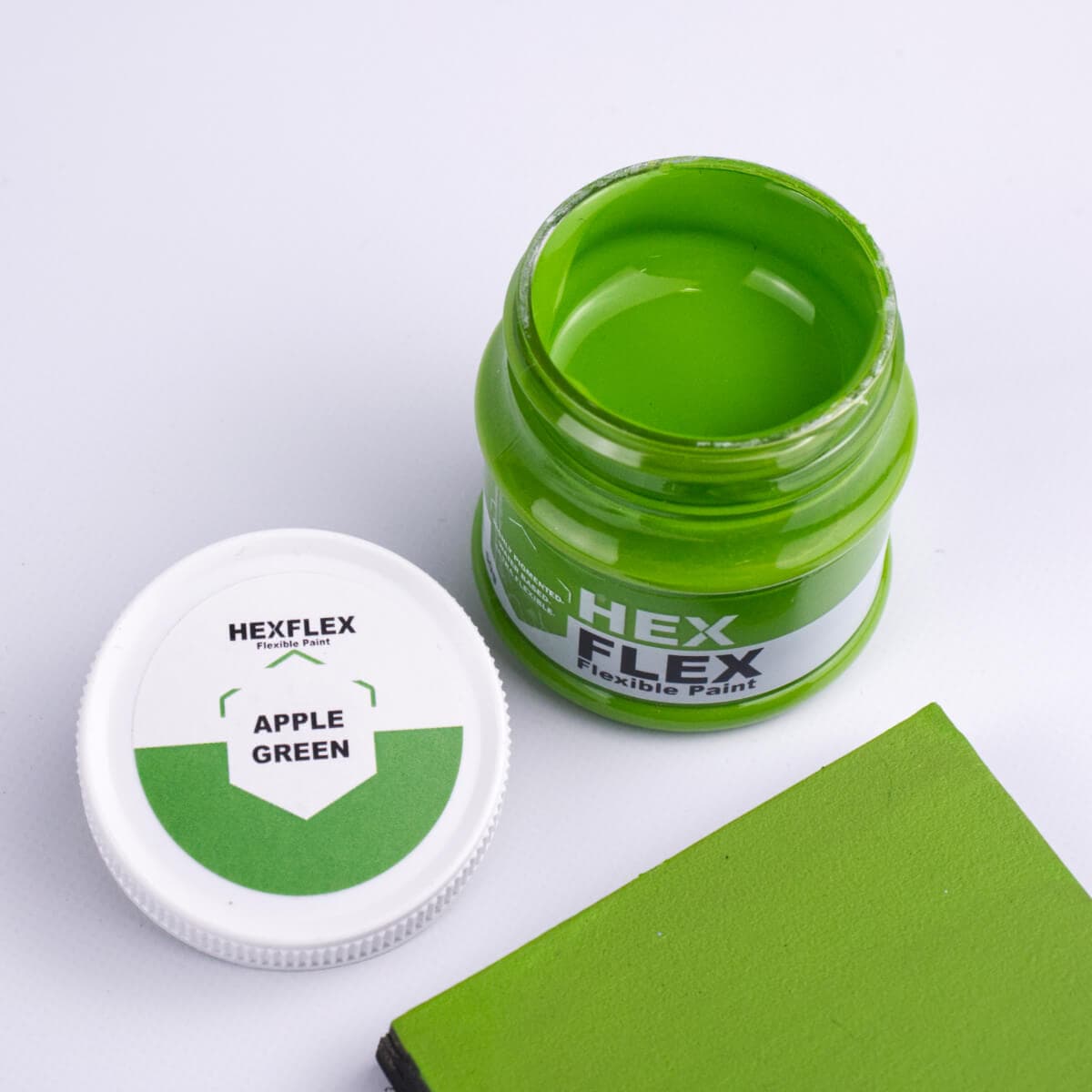 The bottle, cap and apple green HexFlex colour sample