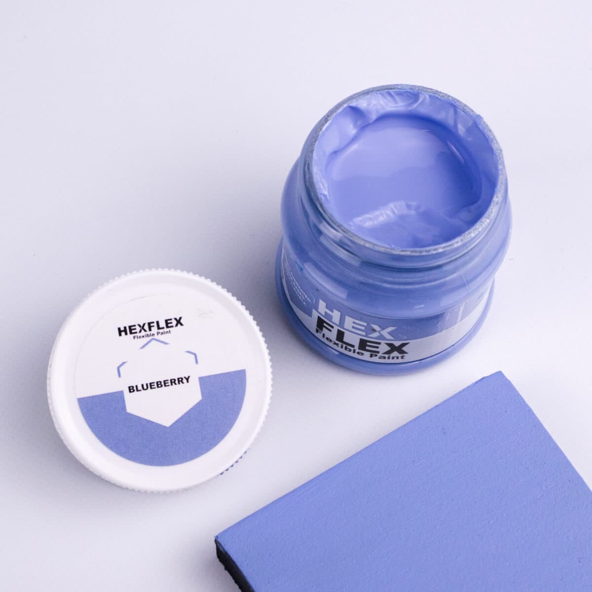 The bottle, cap and blueberry HexFlex colour sample