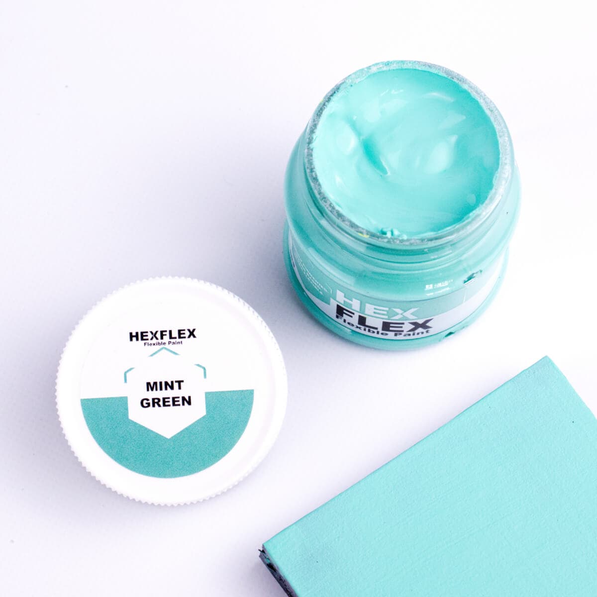 The bottle, cap and mint green HexFlex colour sample