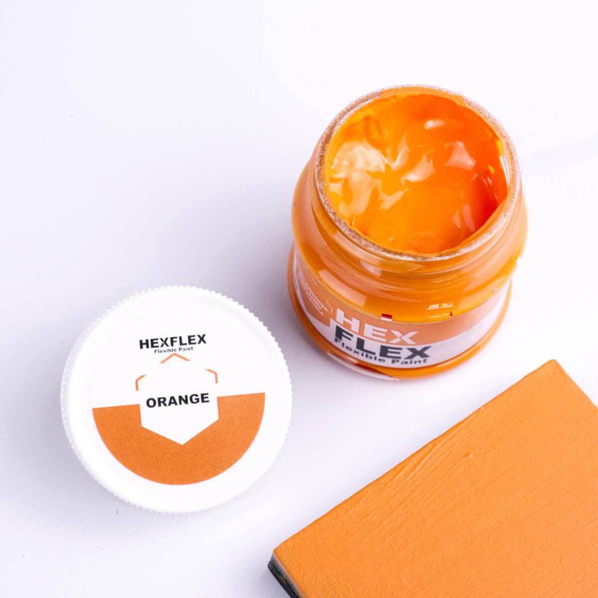 The bottle, cap and orange HexFlex colour sample