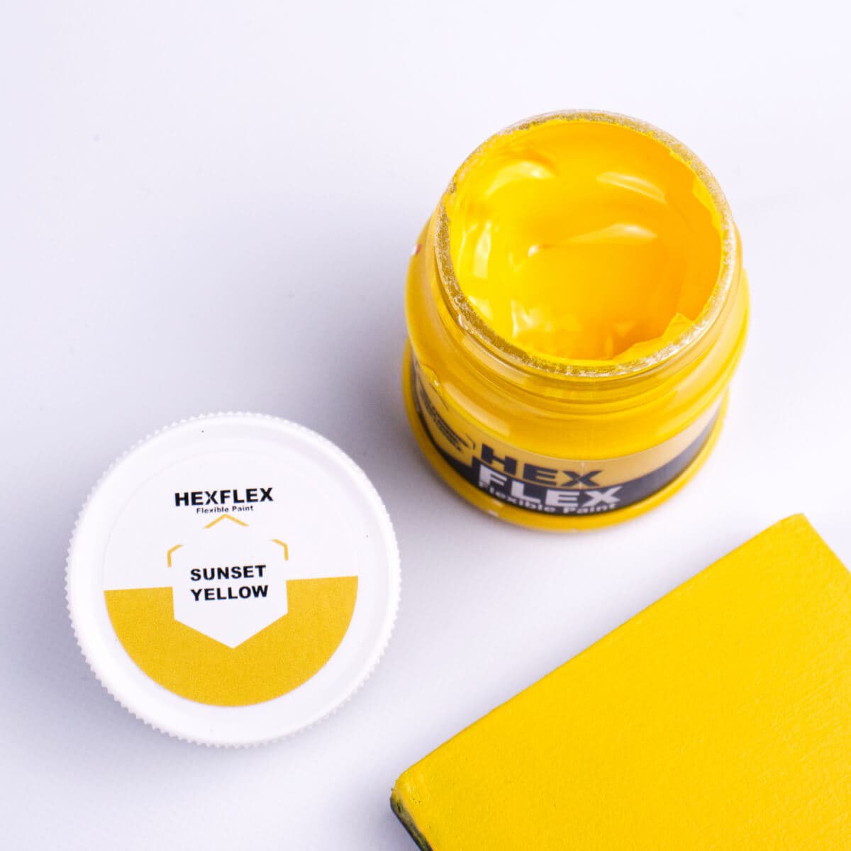 The bottle, cap and sunset yellow HexFlex colour sample