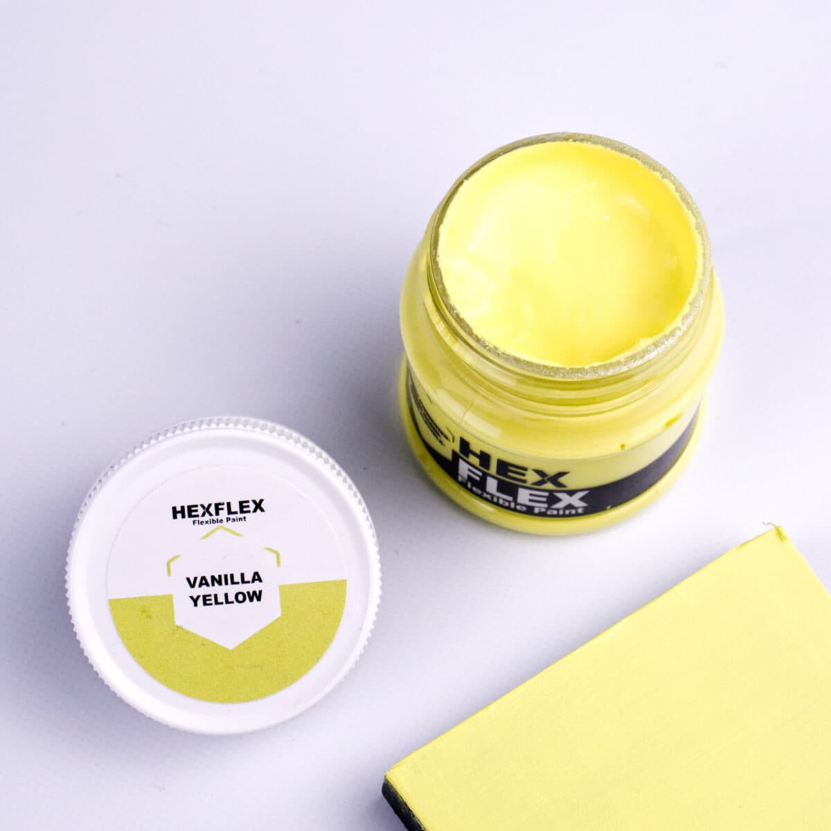 The bottle, cap and vanilla yellow HexFlex colour sample