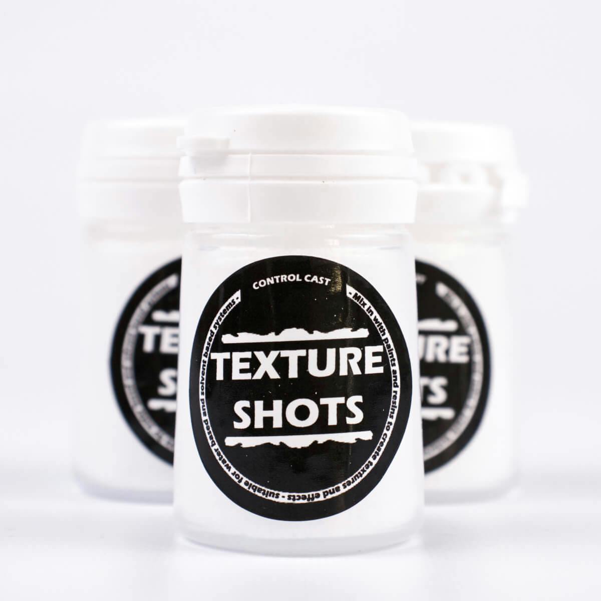 Small containers of Texture Shot powder